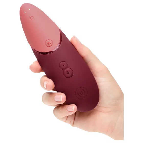 Womanizer Next - klitorinis stimuliatorius su oro bangomis - įkraunamas - bordo